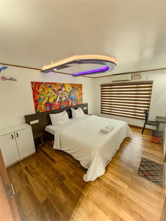 Bright double bedroom on a family houseboat