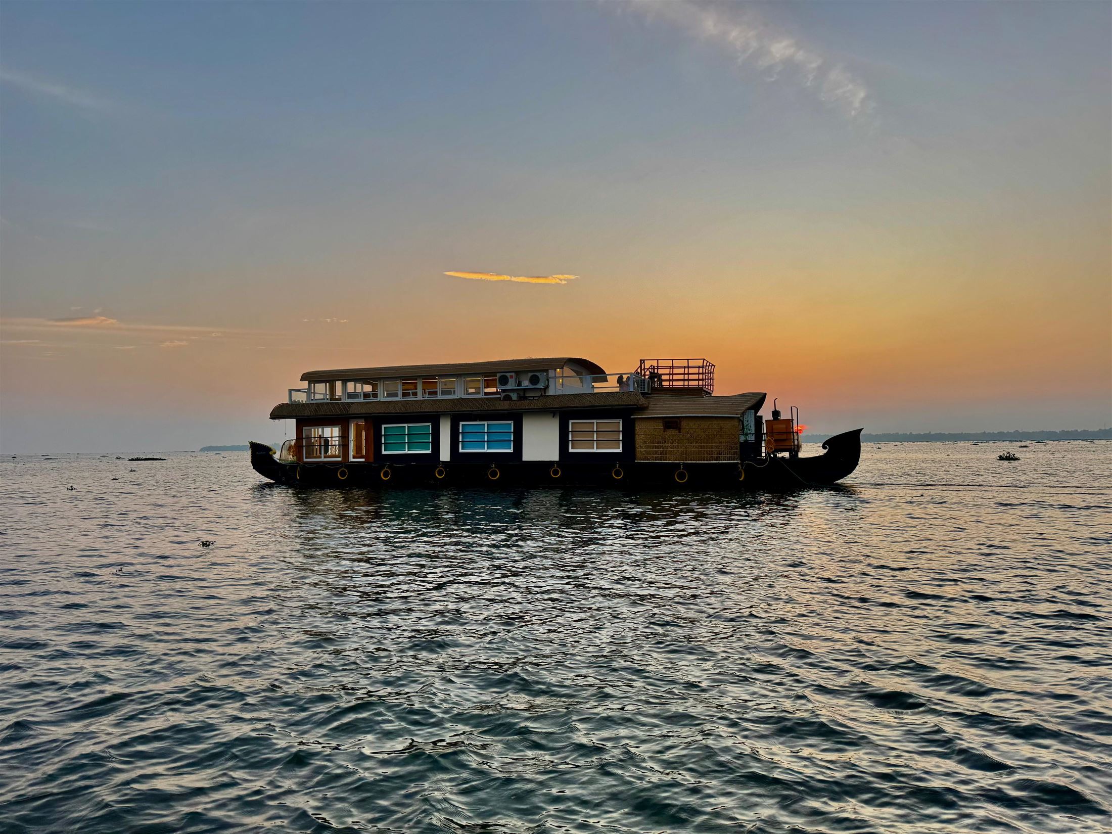 Houseboat on the backwaters at sunset