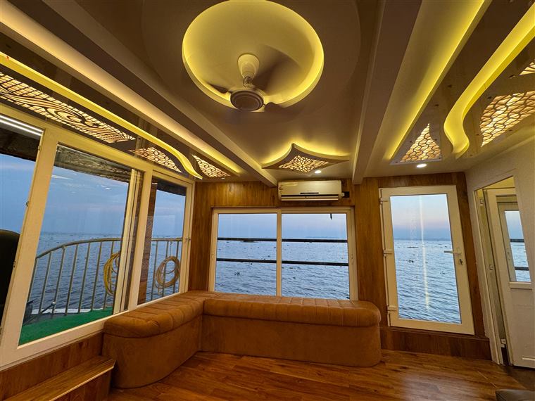Premium houseboat lounge with lake views